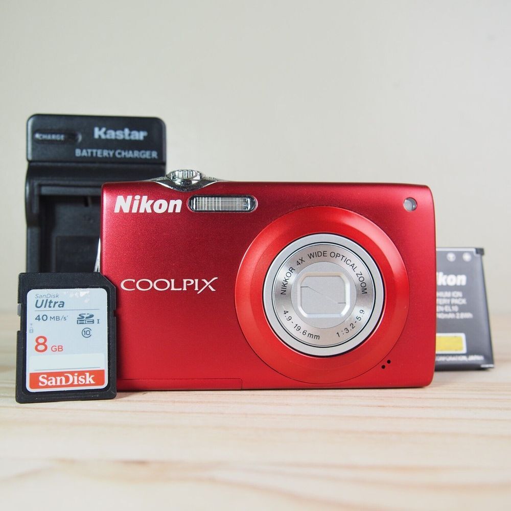Nikon Coolpix S205 12.0MP Digital Camera Bundle Red w/Charger + Battery + 8GB